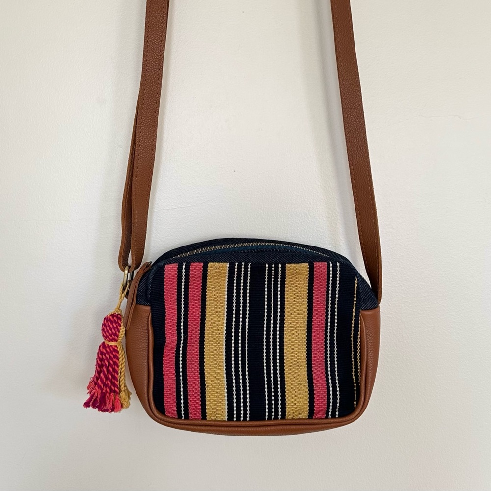 Striped Black and Brown Crossbody Bag with Pink and Gold Accents